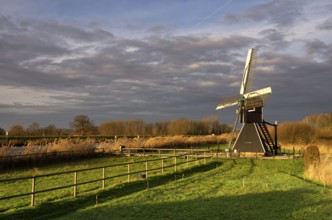 The Follega windmill near the Dutch village Laag-Keppel seen under a clouded sky just before the