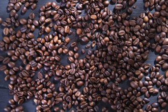 Presentation of coffee beans on the table in black