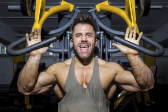 An image of a handsome bearded bodybuilding man doing chest workout