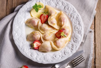 Pierogi with strawberries