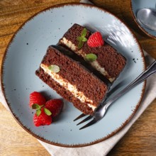 Rustic chocolate cake with raspberries and coffee