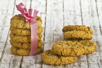 Delicious biscuits on a decorative background
