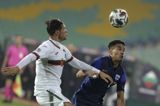 Sofia, Bulgaria - 15 November, 2020: Bulgaria's Strahil Popov (L) in action with Finland's Pyry