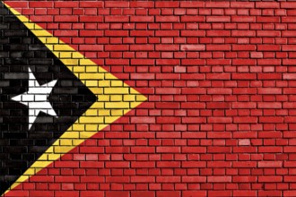 Flag of East Timor painted on brick wall