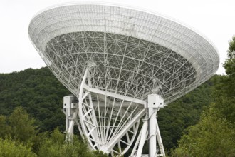 The photo shows a radio telescope