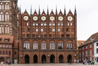 Stralsund, Germany, July 31, 2019: Scenic view of Alter Markt and the City Hall in the old town.