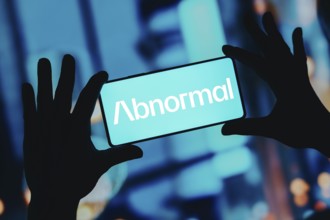 In this photo illustration, the Abnormal Security logo is displayed on a smartphone screen