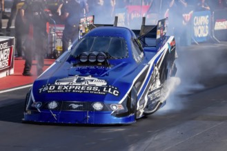 NHRA driver, Terry Haddock, prepares to qualify for the Dodge Power Brokers NHRA Mile-High