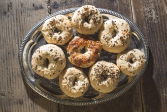 Bagels on a vintage table. Old vintage pan