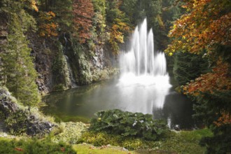 Magnificent dance fountain in well-known Butchard-garden on island Vancouver