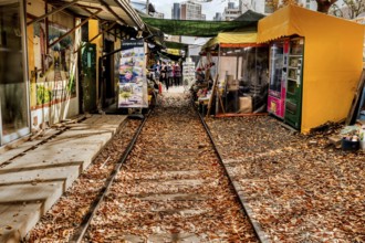 Gunsan, South Korea, November 3, 2020: Unidentified people walking through Gyeongamdong Railroad