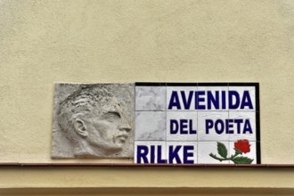 Memorial plaque on a wall with a relief image and Rilke's name, Ronda, Malaga province, Andalusia,