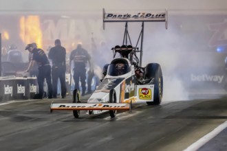 Sep 22, 2023-Concord, NC: NHRA Top Fuel Dragster Series driver, Clay Millican, runs down the lane