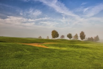 Autumn landscape on the empty golf course