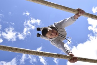 A young gymnast. Sports training for soldiers