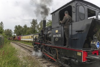 Steam locomotive of Rhine Tourist Railway in spring. Volgelsheim, Alsace, France