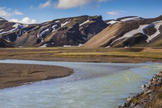 The picturesque valley in the national park Landmannalaugar, Iceland. Summer flood of meltwater