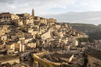 Scenic cityscape of historic downtown Matera in the evening, Italy