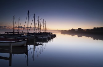 Calm yacht harbor at sunrise, Netherlands