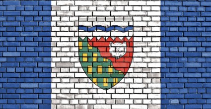 Flag of Northwest Territories painted on brick wall