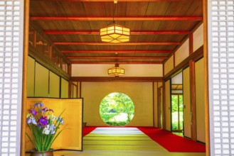Round window and the fresh green of Meigetsuin. Shooting Location: Kamakura, Kanagawa Prefecture