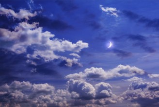 Moon on the sky with curly clouds