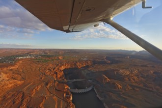 Magnificent Glenn ?anyon Dam on a sunset, photographed from the plane
