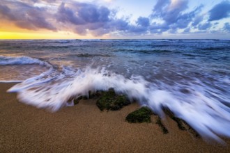 A dramatic sunset looking over the Pacific Ocean. Kauai, Hawaii