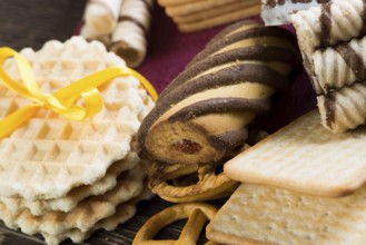 Cookies and biscuits for celebration on wooden table