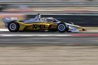 SCOTT MCLAUGHLIN (3) of Christchurch, New Zealand drives through the turns during a practice