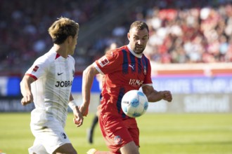 Football match, Ritsu DOAN SC Freiburg left in a duel for the ball with Benedikt GIMBER 1.FC