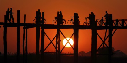 Myanmar, Wooden bridge at Inle Lake at sunset, Inle Lake, Myanmar