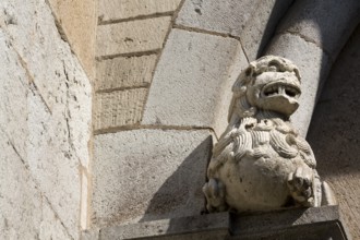 Romanesque lion, Saint, Saint