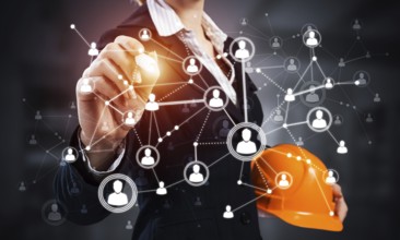 Businesswoman pointing on abstract 3d network. Back view of woman engineer in business suit and