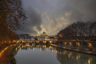 View over the river Tiber in a historic city. The old famous bridge Ponte Sant'Angelo, in the