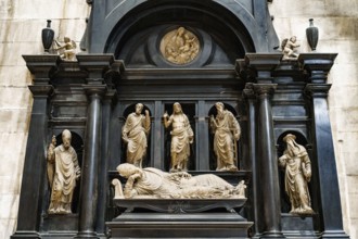 Statue of the lying cardinal in the Duomo. Milan, Italy.