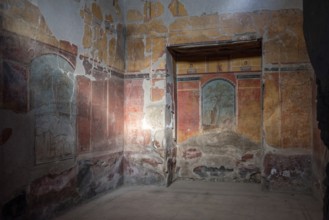 OPLONTIS, ITALY, MAY 03, 2022, Scenic frescos on the wall of famous Villa Oplontis, ancient Roman