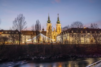 Illuminated Mariahilferkirche, river Mur, blue hour, Graz, Styria, Austria