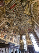 SIENA, ITALY, SEPTEMBER 23, 2023, Rich ornate famous Piccolomini Library in the Siena cathedral in
