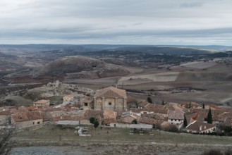 View of the historic town of Atienza with old stone houses against sky