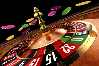 Roulette in casino chips from flying, wide shot on a black background