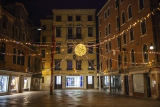 Light decoration on a square in the old town centre, night shot, Venice, Italy