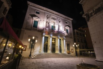 Entrance area, facade of the opera house Teatro la Fenice, night shot, Venice, Veneto, Northern