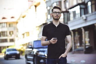 Portrait of handsome caucasian man st street