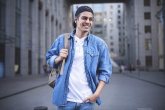 Background on the street while waiting his colleagues. Businessman wearing casual white shirt and