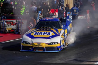 NHRA driver, Ron Capps, prepares to qualify for the Dodge Power Brokers NHRA Mile-High Nationals in