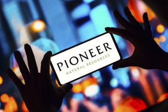 In this photo illustration, the Pioneer Natural Resources Company logo is seen displayed on a