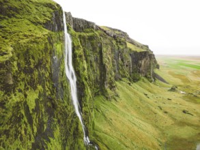 Iceland waterfall nature travel landscape in Icelandic nature background. Popular tourist