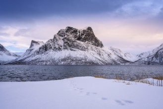 Beautiful winter landscape scene, sunset or sunrise in mountains and fjords