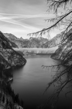 Lake Plansee near Reutte Tyrol in black and white with clouds in the valley